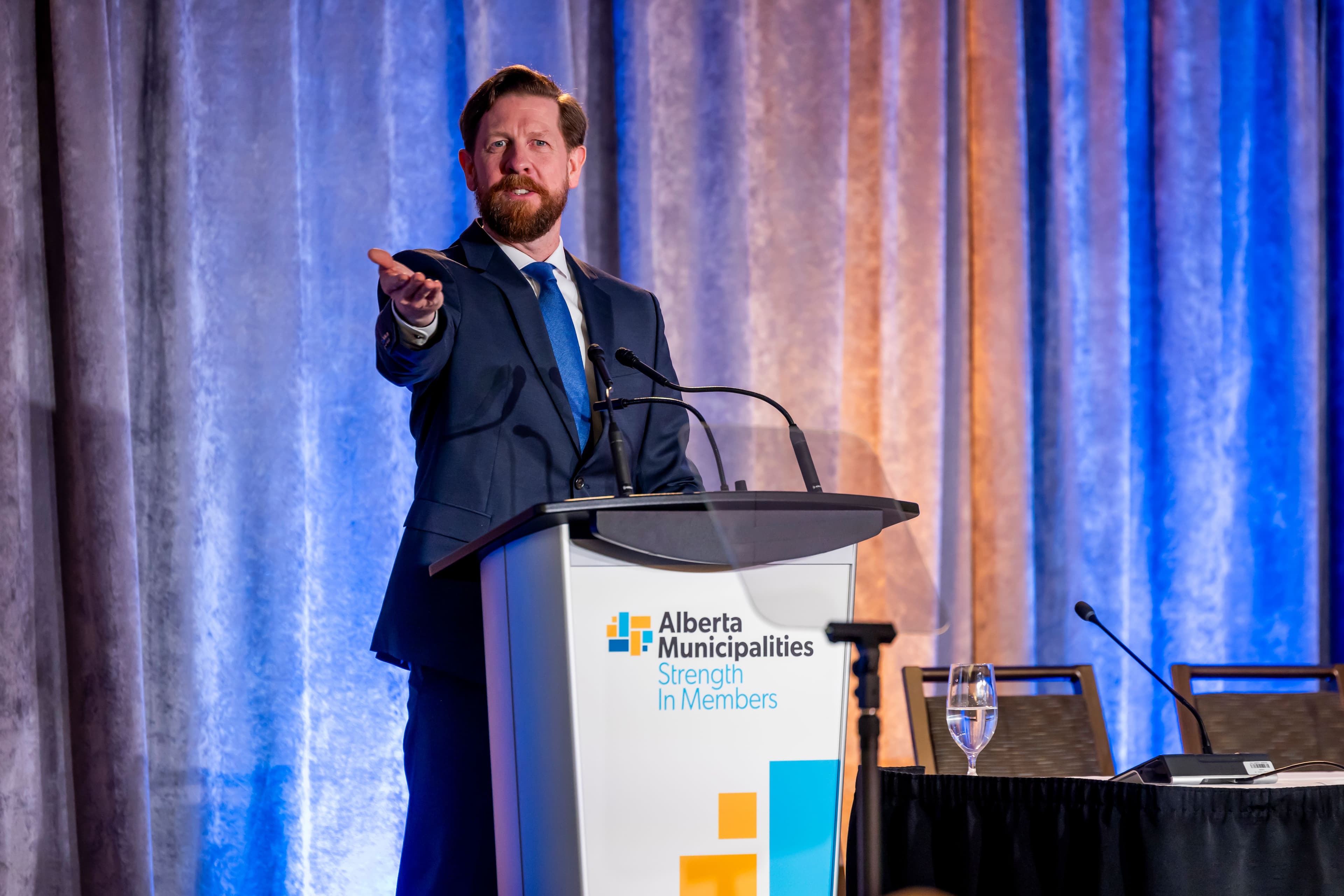 MLA Kyle Kasawski speaks at the Alberta Municipalities conference in 2024.